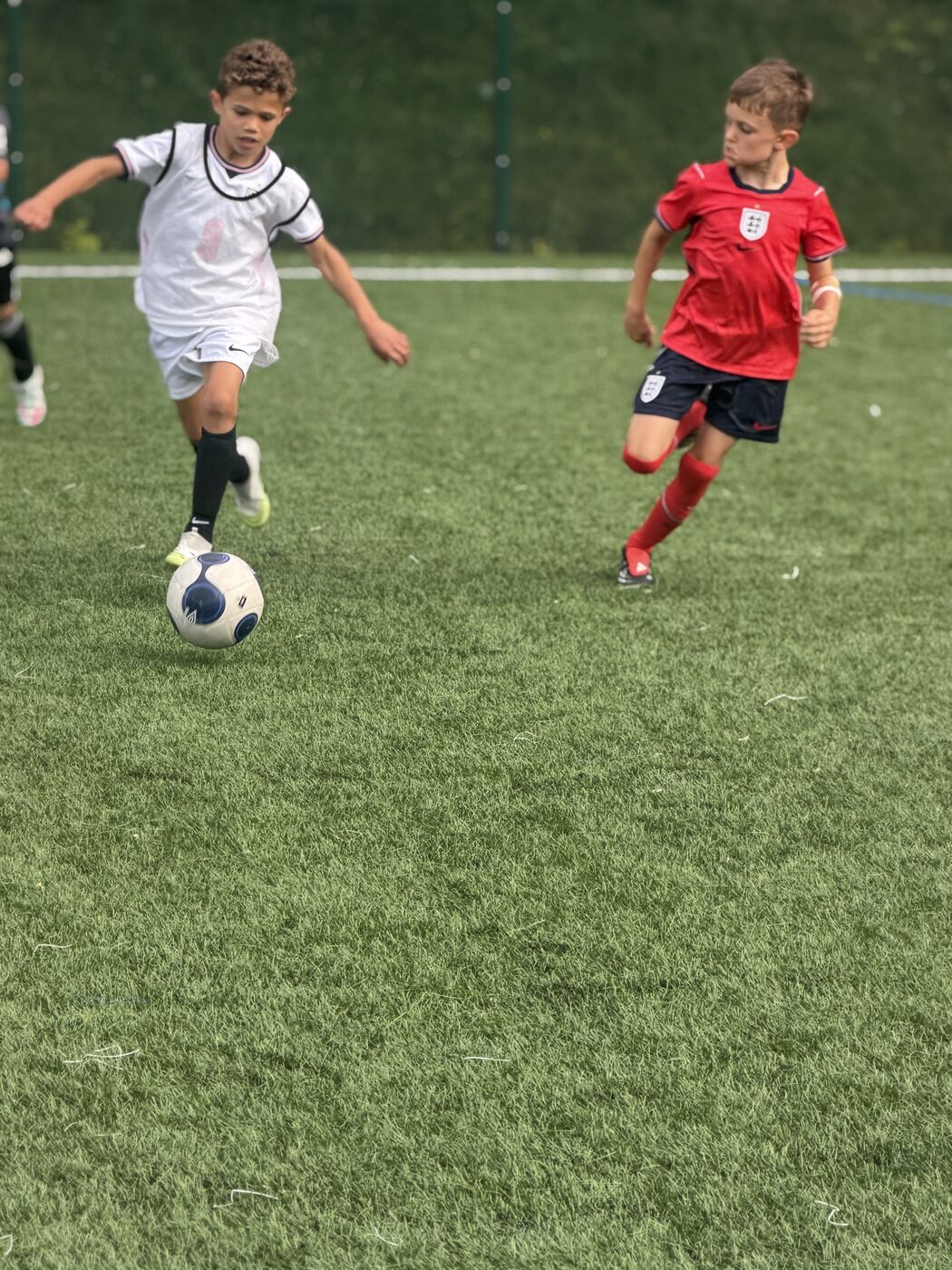 One-v-one duel for the ball at a NextGen session