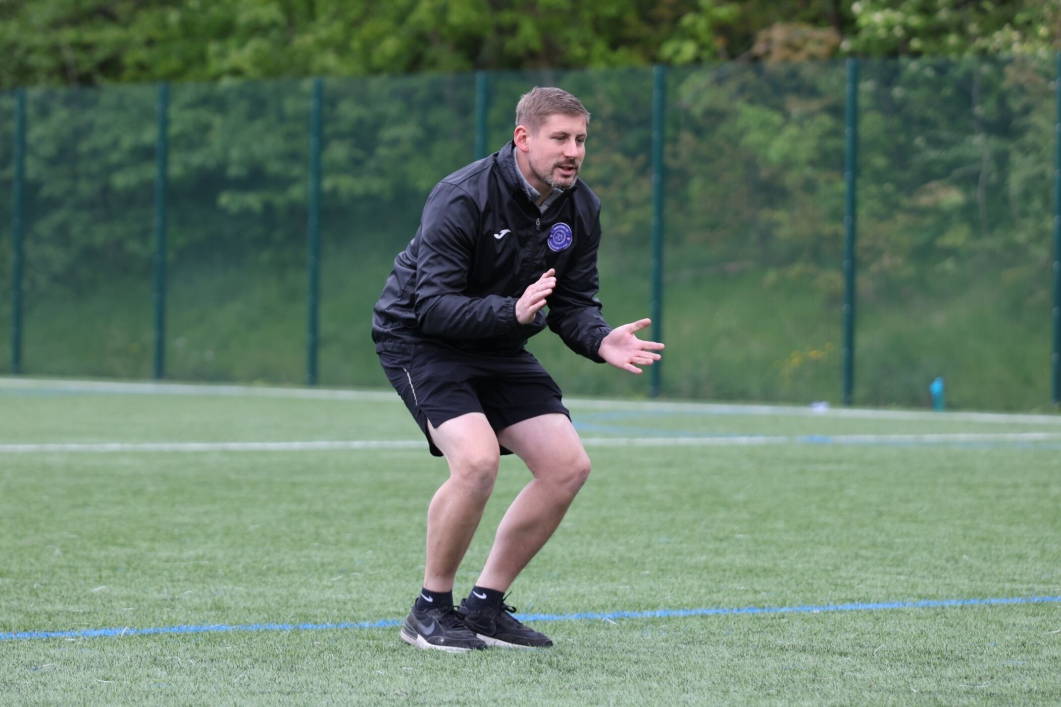 NextGen coach setting up a practice