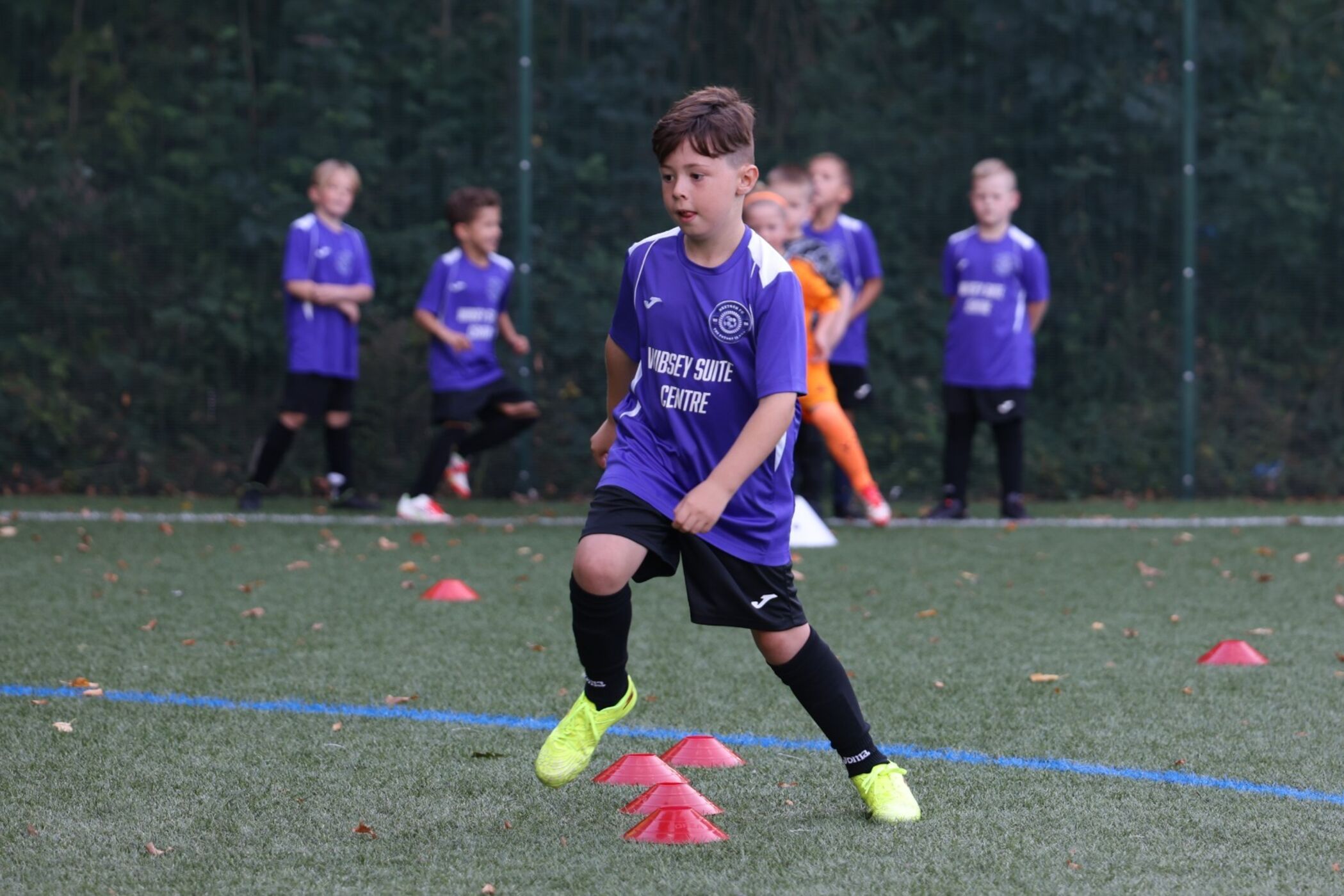 Player working through a cone drill at training